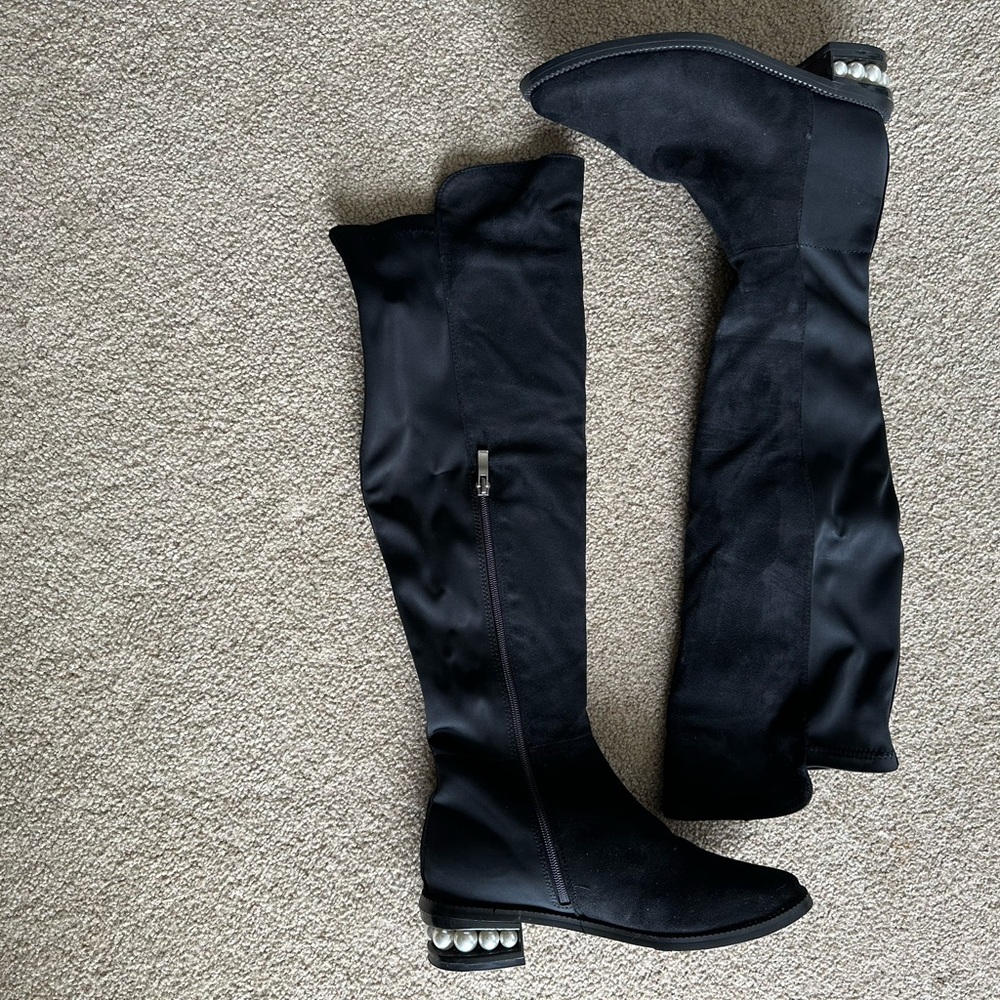 Women’s over the knee boot.